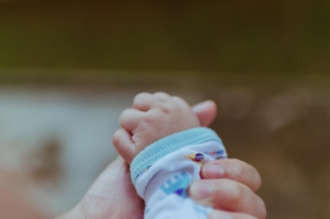baby hand in parent hand